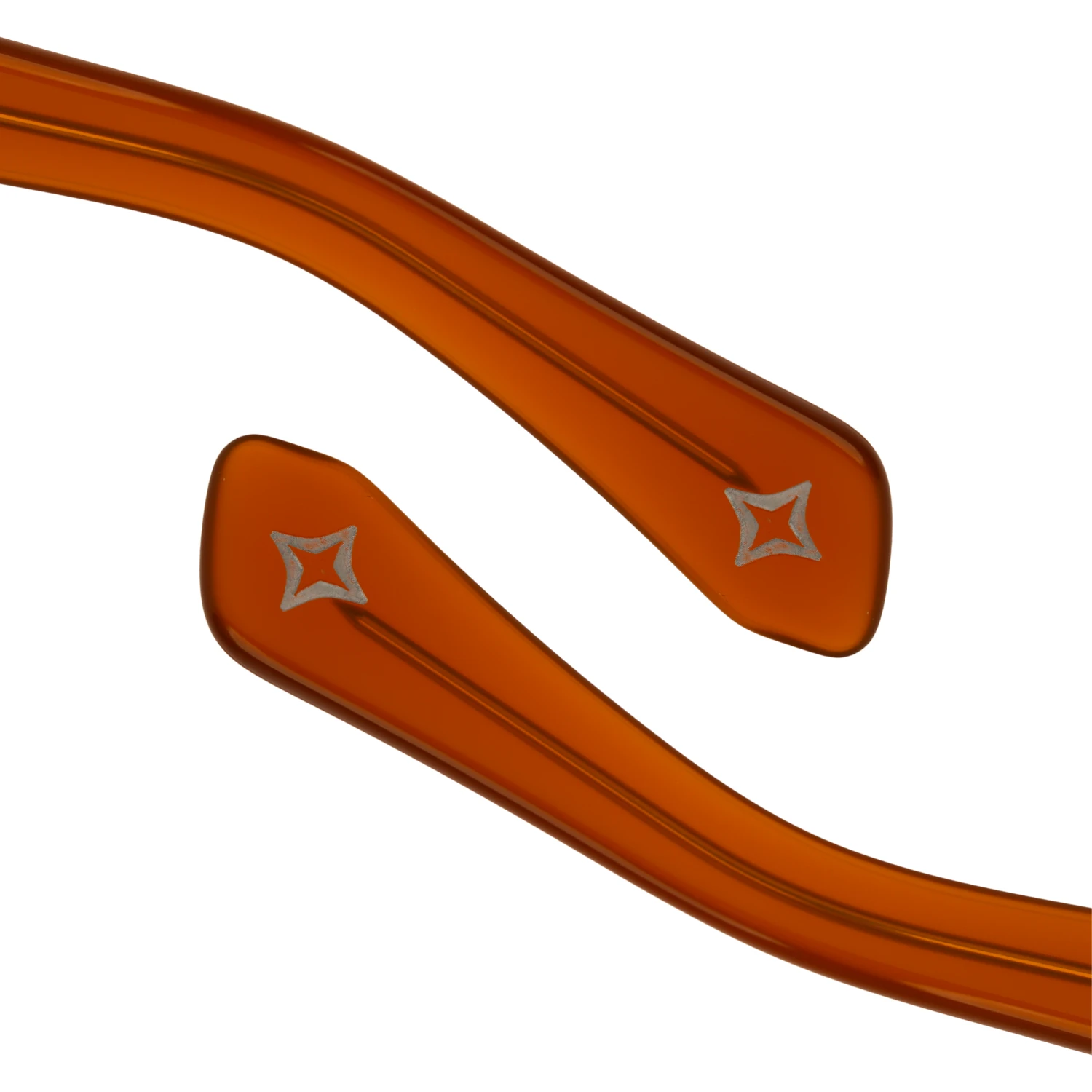 Temple tips of the Amber Snawk Solus sunglasses with the engraved Snawk star