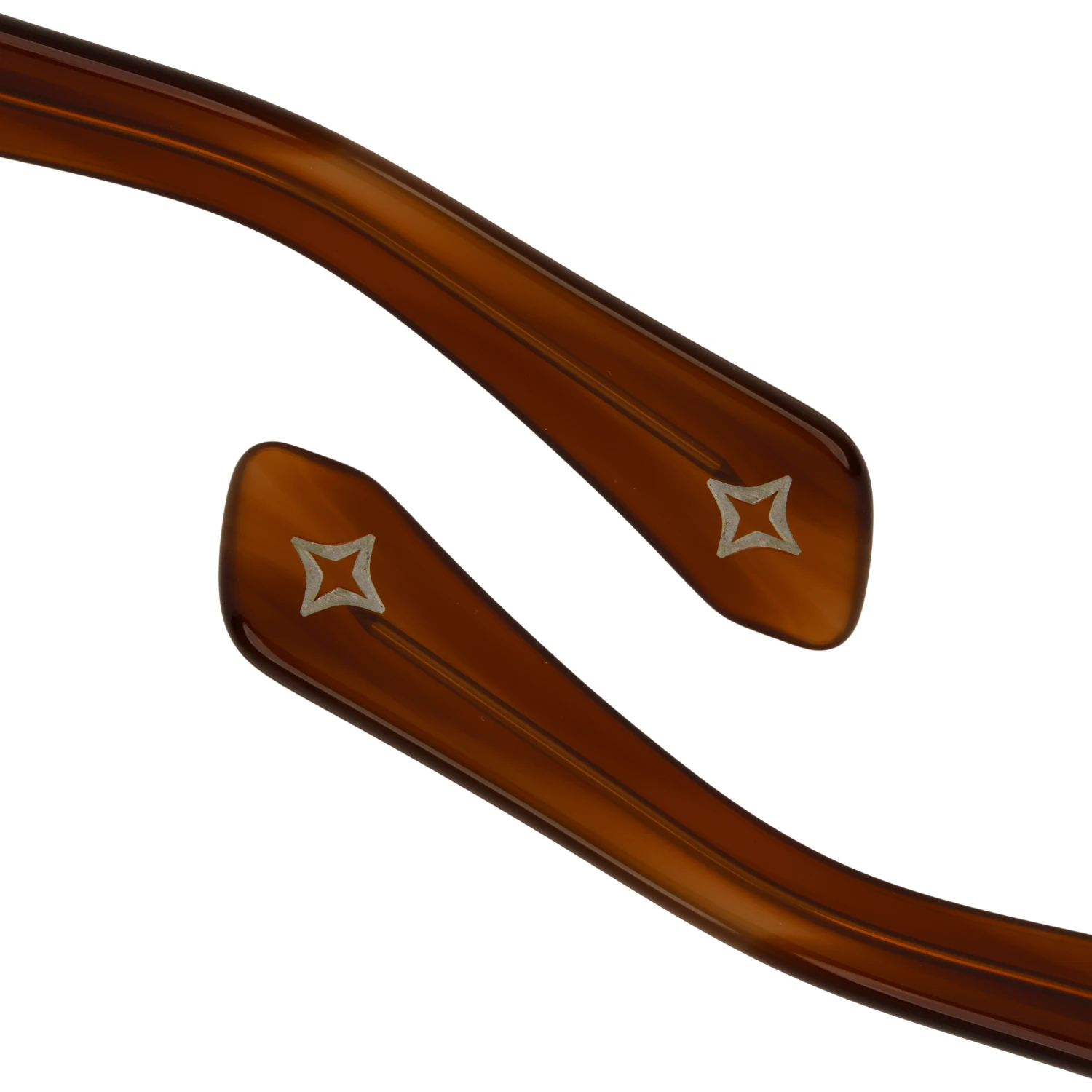 Temple tips of the Tortoise Fade Snawk Solus sunglasses with the engraved Snawk star